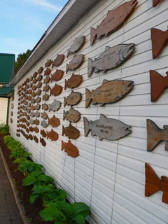 Fish donation plaques on display outside of the museum.